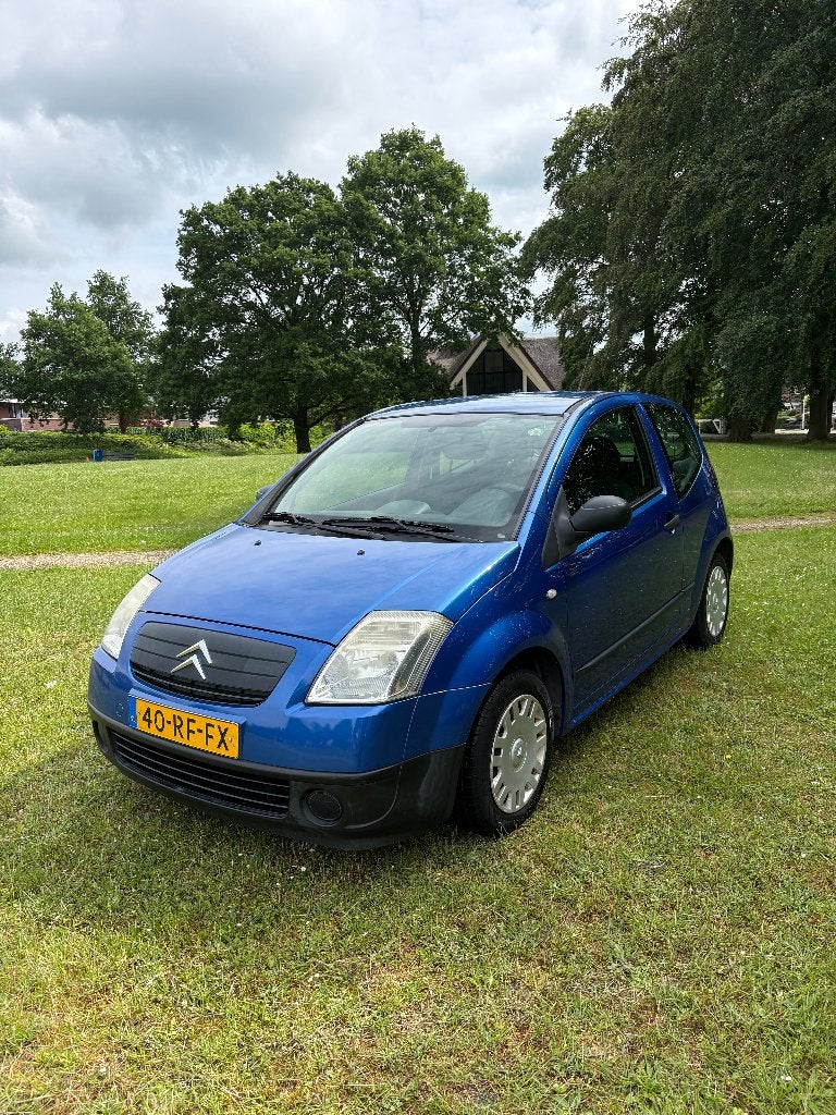 Citroën C2 1.4 I 2005 Blauw, Auto's, Voorwielaandrijving, Zwart, 4 cilinders, Origineel Nederlands