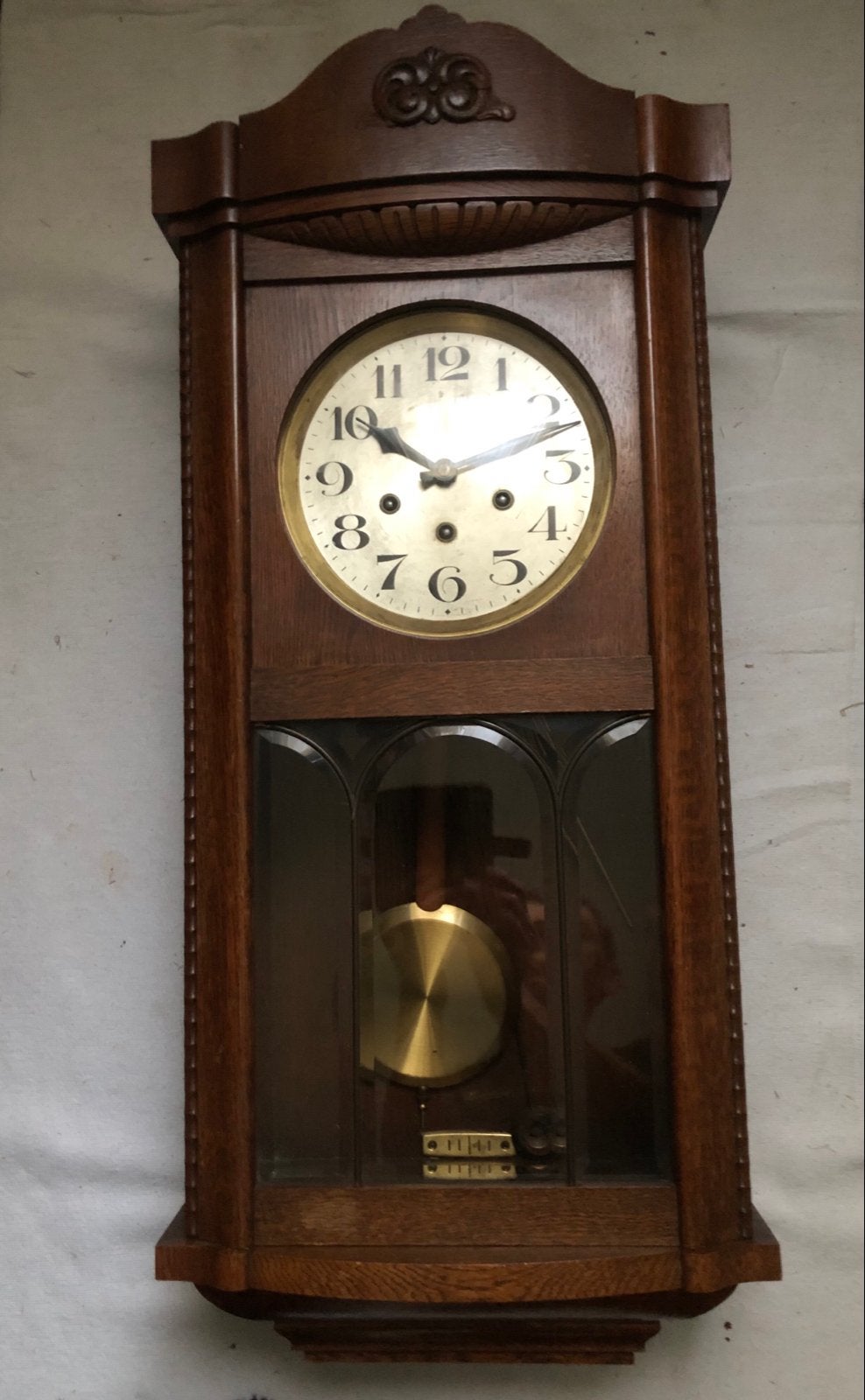 Antieke houten wandklok, Ophalen
