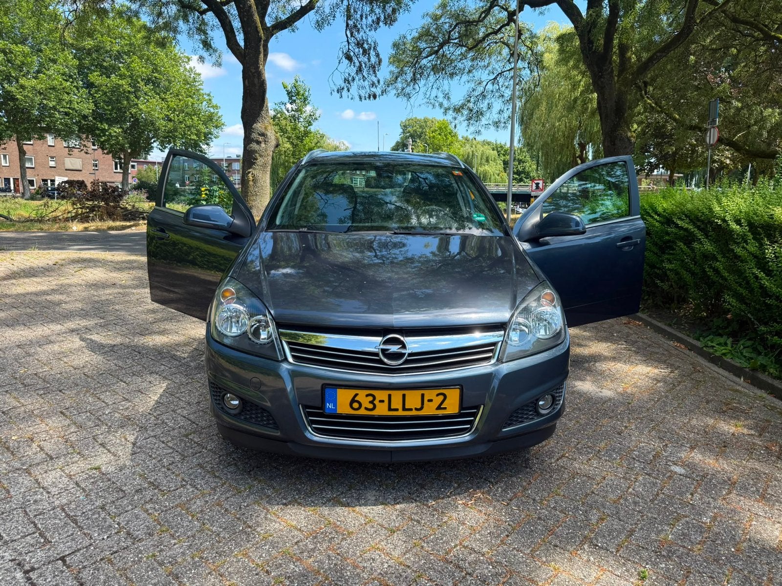 Opel Astra 1.6 16V 85KW St.wgn. 2010 Blauw, Auto's, Voorwielaandrijving, 15 km/l, Blauw, Origineel Nederlands