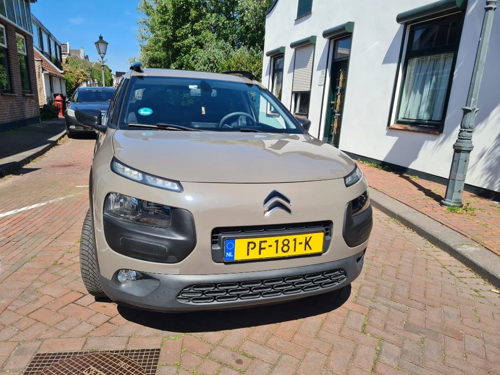 Citroën C4 Cactus 1.2 82 pk Shine - Bruin, Auto's, Voorwielaandrijving, Stof, 1199 cc, Bruin