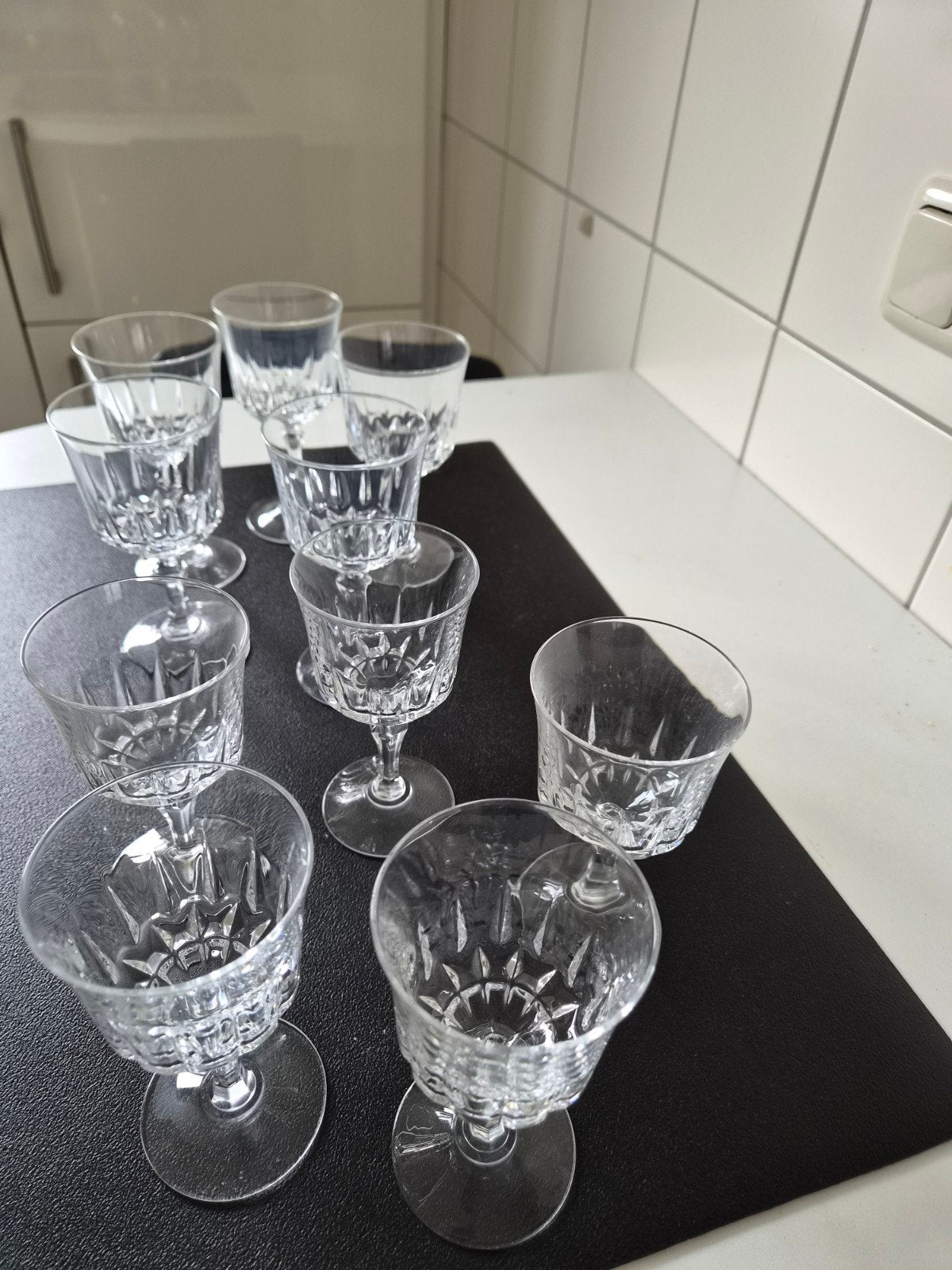 Set van 10 kristallen glazen met geslepen patroon, Ophalen