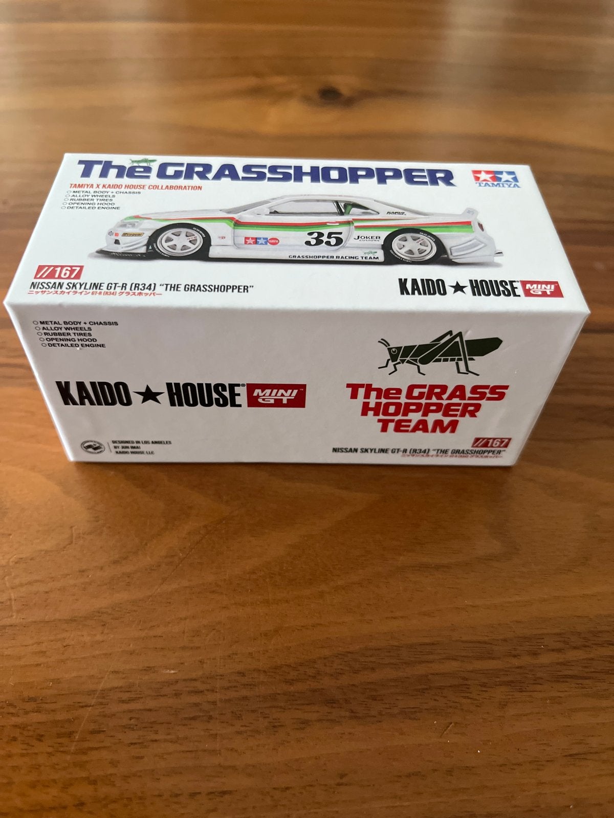 Kaido Mini GT Nissan Skyline GT-R R34 The Grasshopper 1:64, Hobby en Vrije tijd, Ophalen of Verzenden, Nieuw, Auto, Overige merken