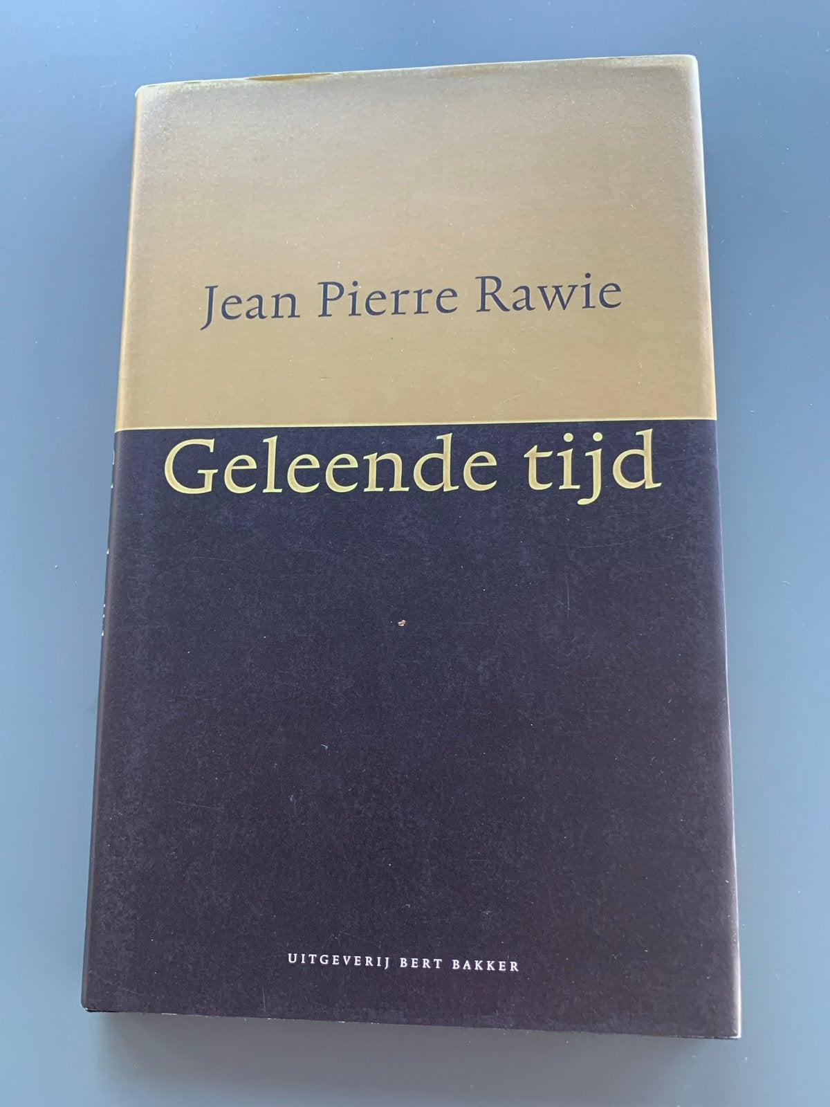 Geleende tijd - Jean Pierre Rawie (Uitgeverij Bert Bakker), Ophalen of Verzenden, Gelezen, Nederland
