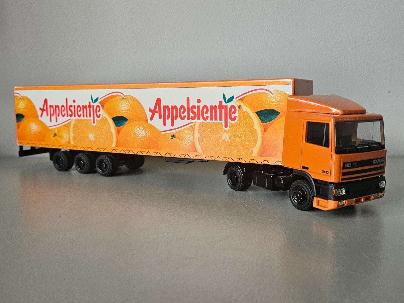 Lioncar Daf 95 Appelsientje trailer 1:50, Ophalen of Verzenden, Zo goed als nieuw, Bus of Vrachtwagen, Lion Toys