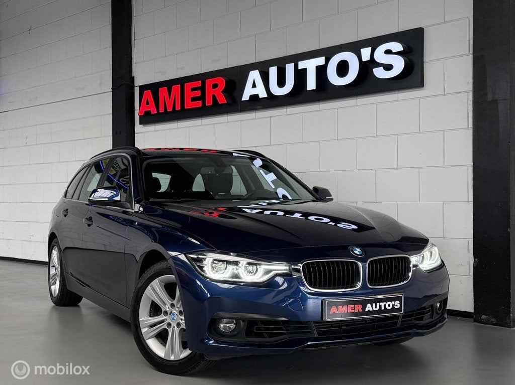 BMW 318i Touring High Executive/Led/Navi/NL-Auto/Automaat/!, Auto's, Automaat, Gebruikt, Blauw, 1465 kg