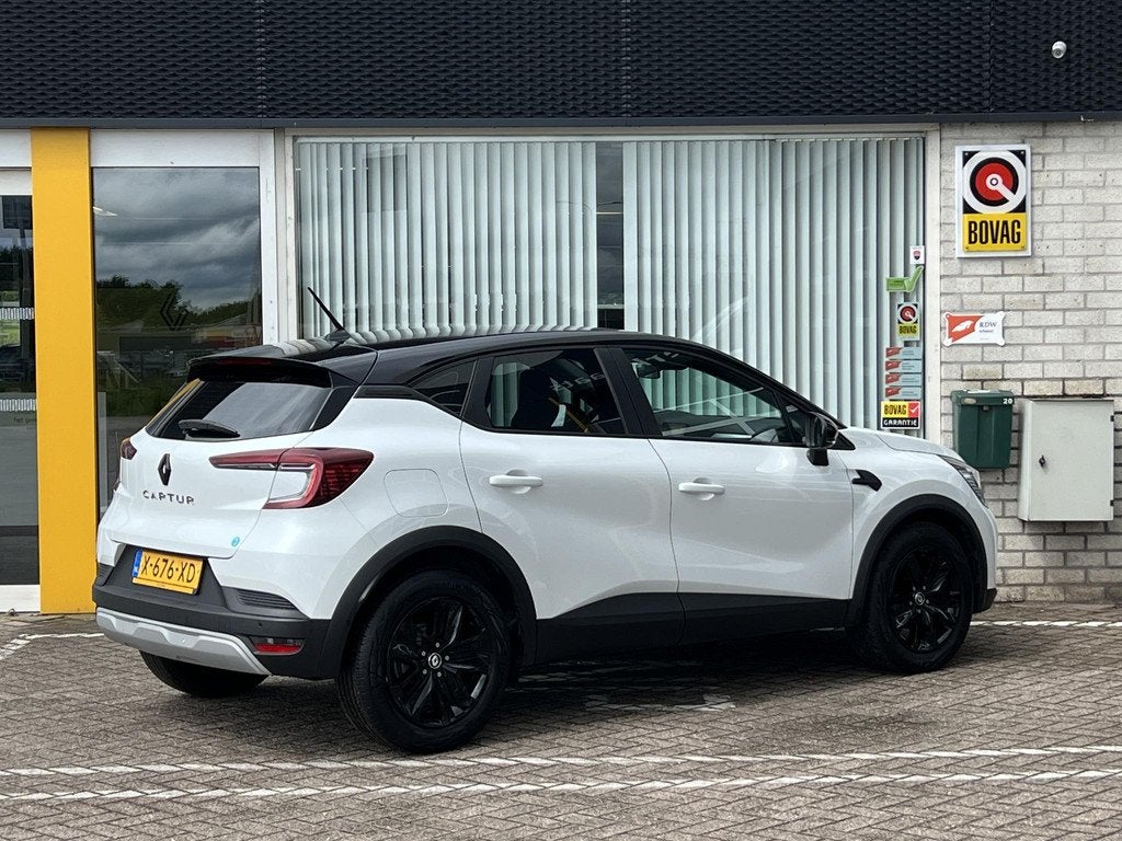 Renault Captur 1.0 TCe 90 evolution Black Line | Navigatie |, Auto's, Renault, Stof, Gebruikt, Met garantie (alle), 635 kg
