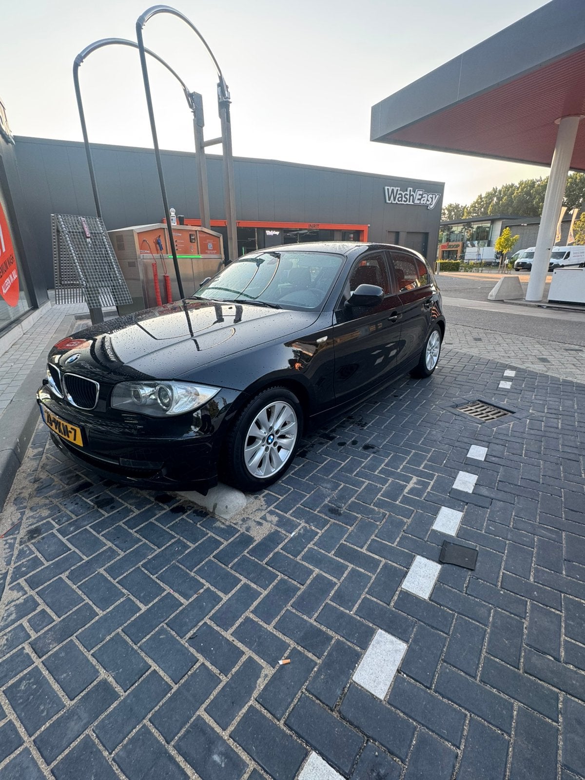 BMW 1-Serie 2.0 116I 5DR 2011 Zwart, Auto's, BMW, 1-Serie, Achterwielaandrijving, 1995 cc, Zwart
