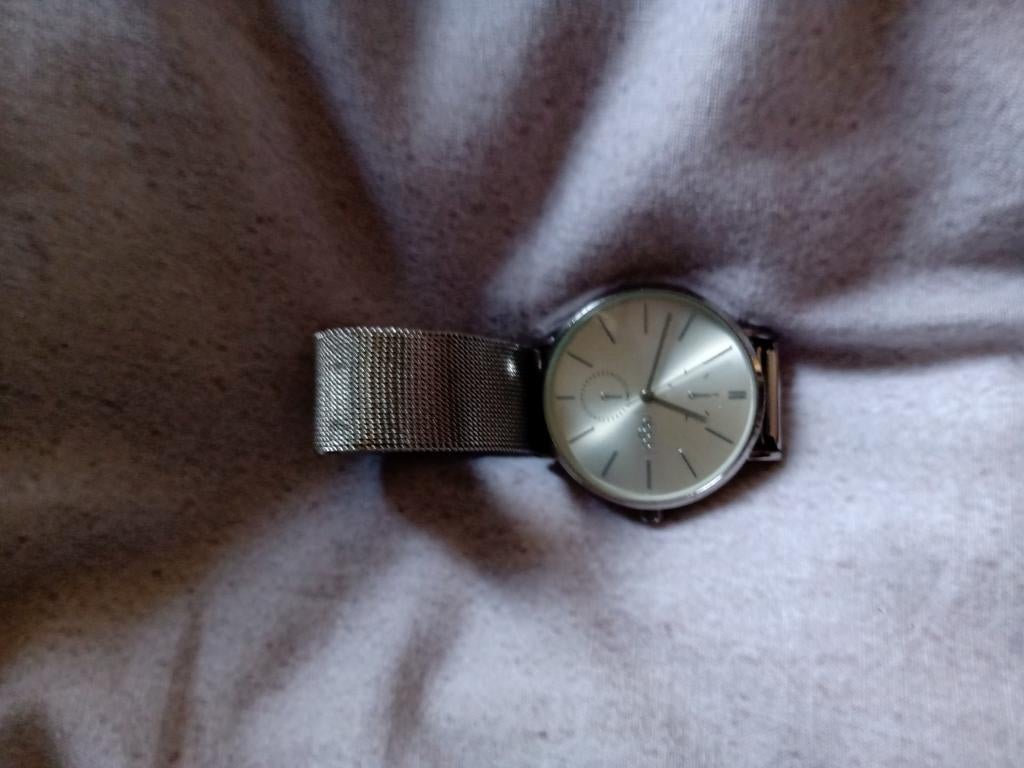 Regal dames horloge zilverkleurig met mooi band patroon, Ophalen of Verzenden