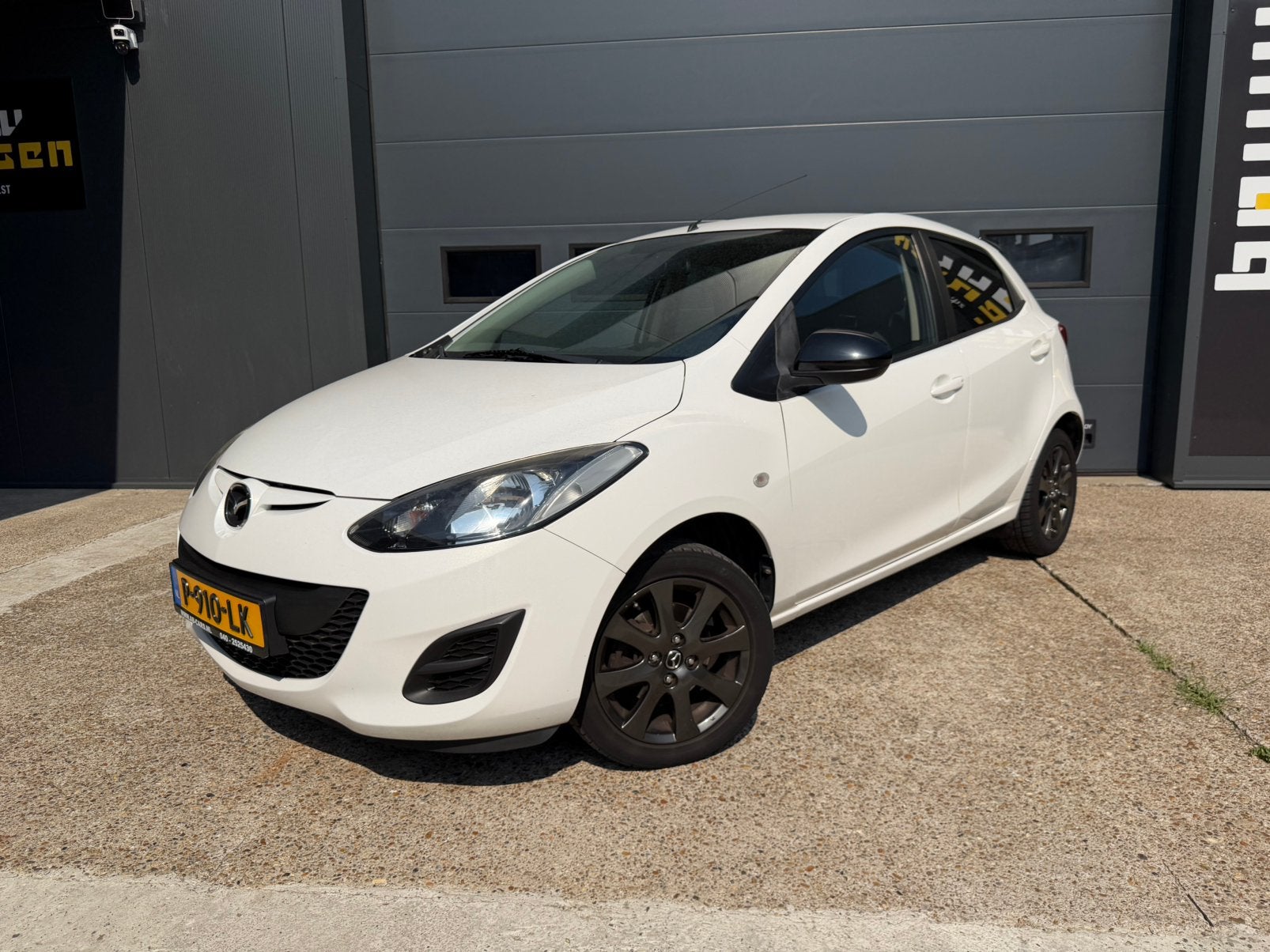 Mazda 2 1.3 55KW 5DRS 2014 Wit, Auto's, Mazda, Bedrijf, ABS, Airbags, Airconditioning, Bluetooth, Bochtverlichting, Boordcomputer