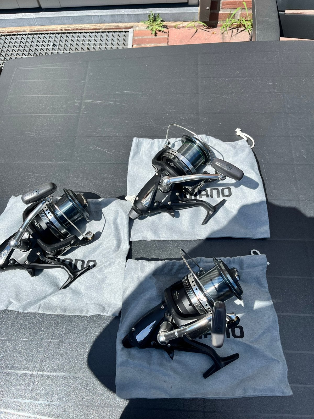 3x Shimano Big Baitrunner XT-A Long Cast Molens, Ophalen, Zo goed als nieuw, Molen