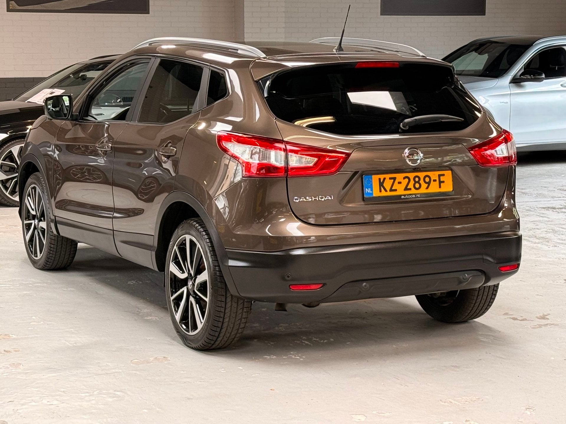 Nissan Qashqai 1.2 Tekna Panorama Leder Navigatie Cruise con, Auto's, Nissan, Voorwielaandrijving, Gebruikt, 4 cilinders, Bruin