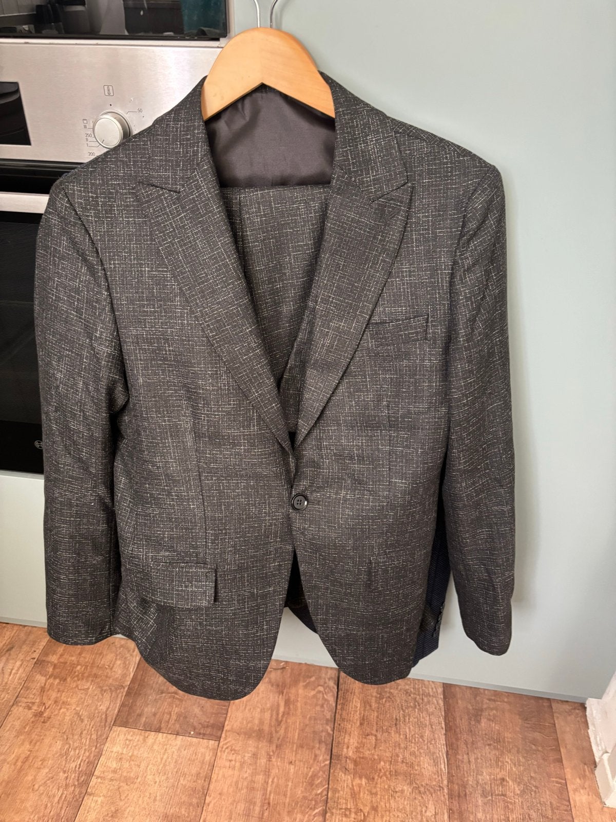 Driedelig pak polyester/viscose maat 48, Ophalen of Verzenden, Zo goed als nieuw, Maat 48/50 (M), Grijs
