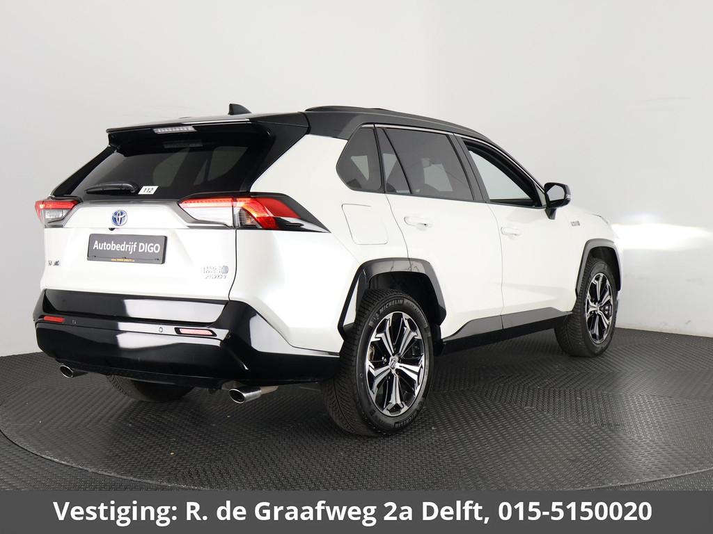 Toyota RAV4 2.5 Plug-in Hybrid AWD Bi-Tone Plus | 1500 KG tr, Auto's, Toyota, Automaat, Gebruikt, 4 cilinders, Wit