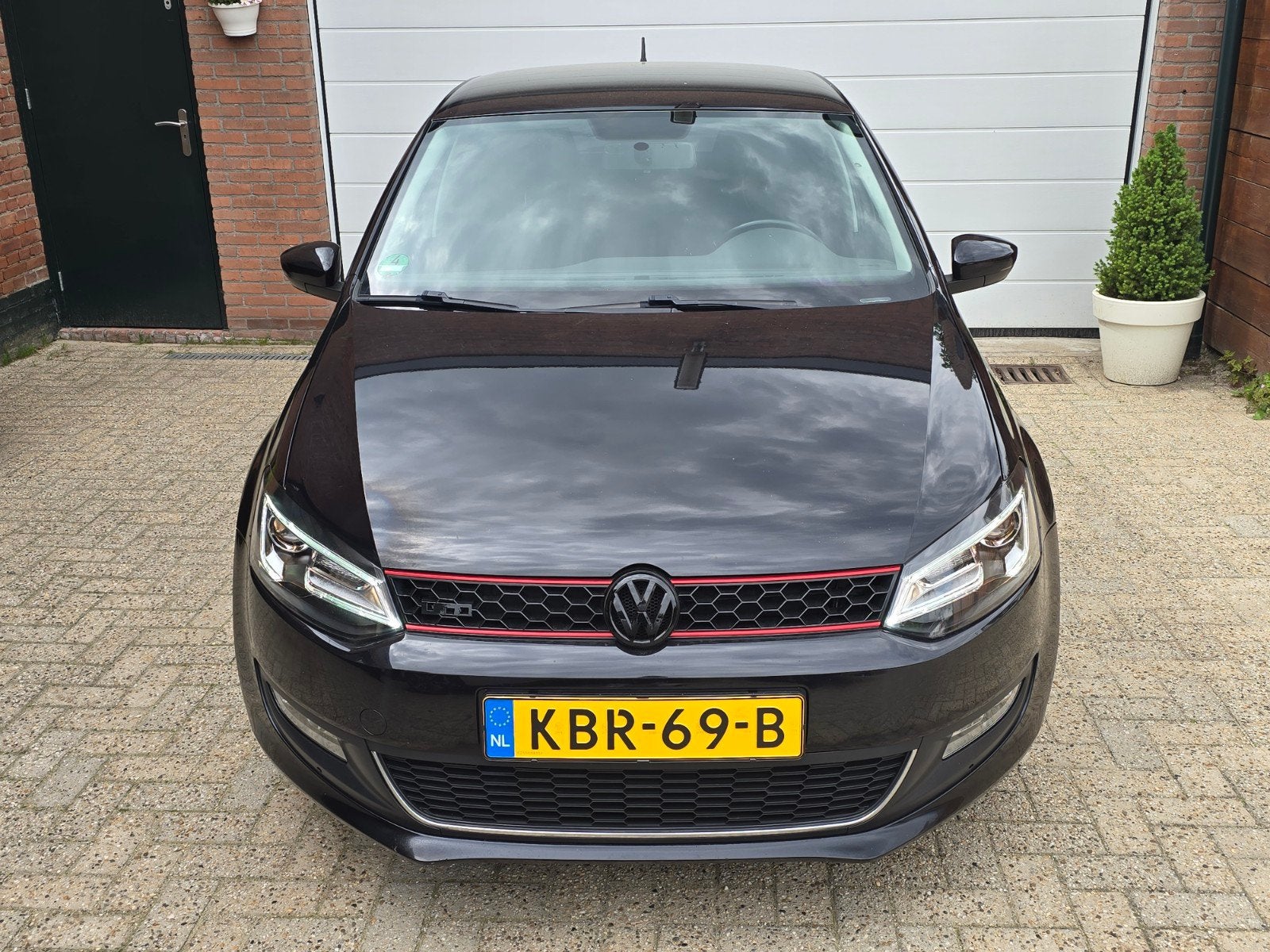 Volkswagen Polo 1.4 16V FSI 63KW/85PK R-Line, Auto's, Voorwielaandrijving, 970 kg, 4 cilinders, Zwart