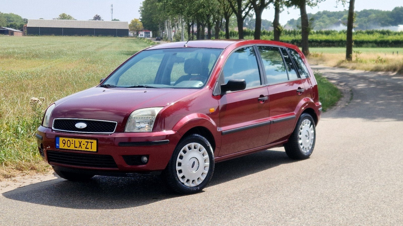 Ford Fusion 1.4 16V AUT 2003 Rood AIRCO 102365 KM, Auto's, 15 km/l, 40 €/maand, Metallic lak, Origineel Nederlands