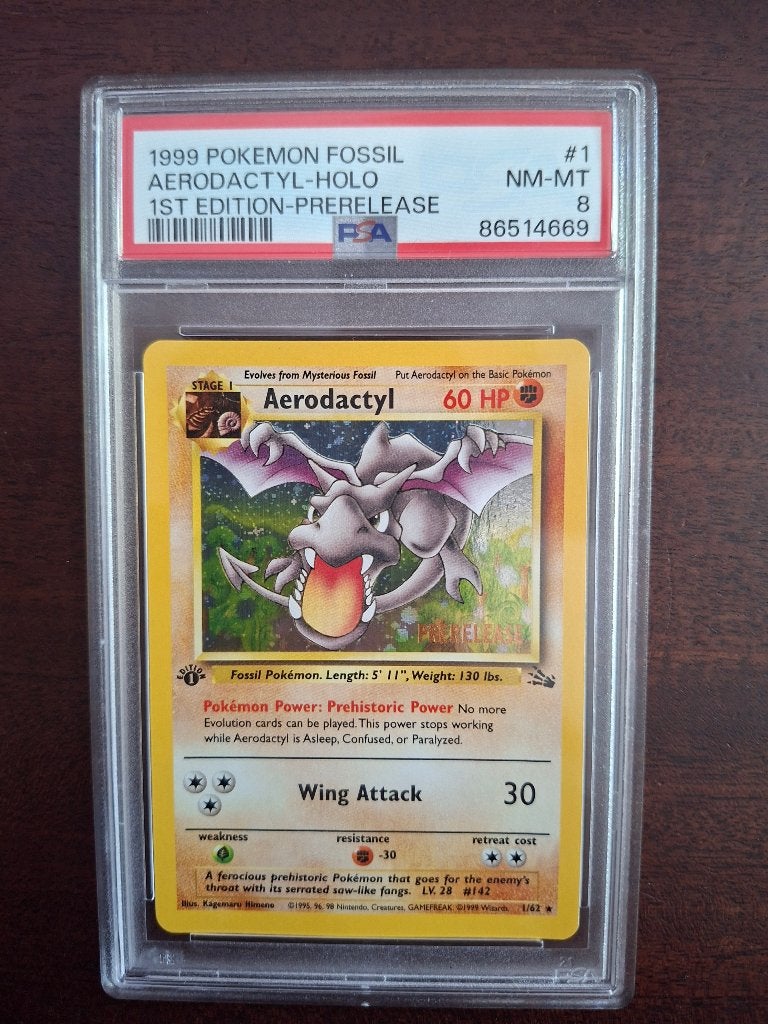 Pokemon / Aerodactyl Holo 1st edition pre-release / PSA 8, Ophalen of Verzenden, Zo goed als nieuw, Losse kaart, Foil