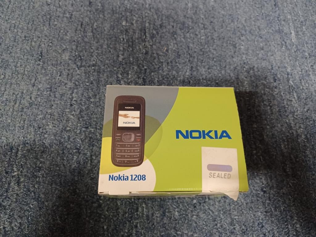 Nokia 1208 nieuw in doos, Telecommunicatie, Mobiele telefoons | Hoesjes en Frontjes | Nokia, Nieuw, Ophalen of Verzenden