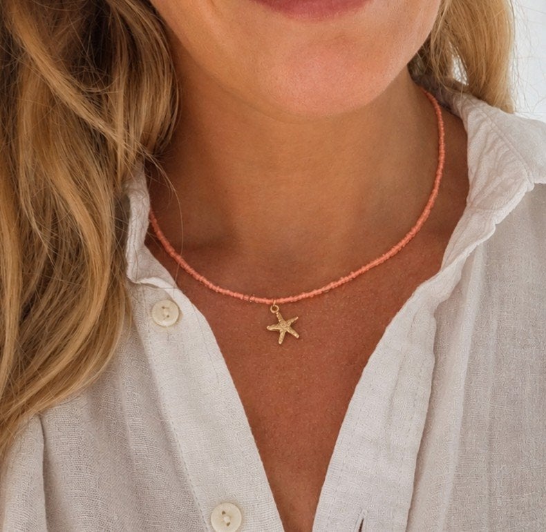 Neon koraalroze kralenketting met zeester hanger, Verzenden, Nieuw, Roze, Overige materialen