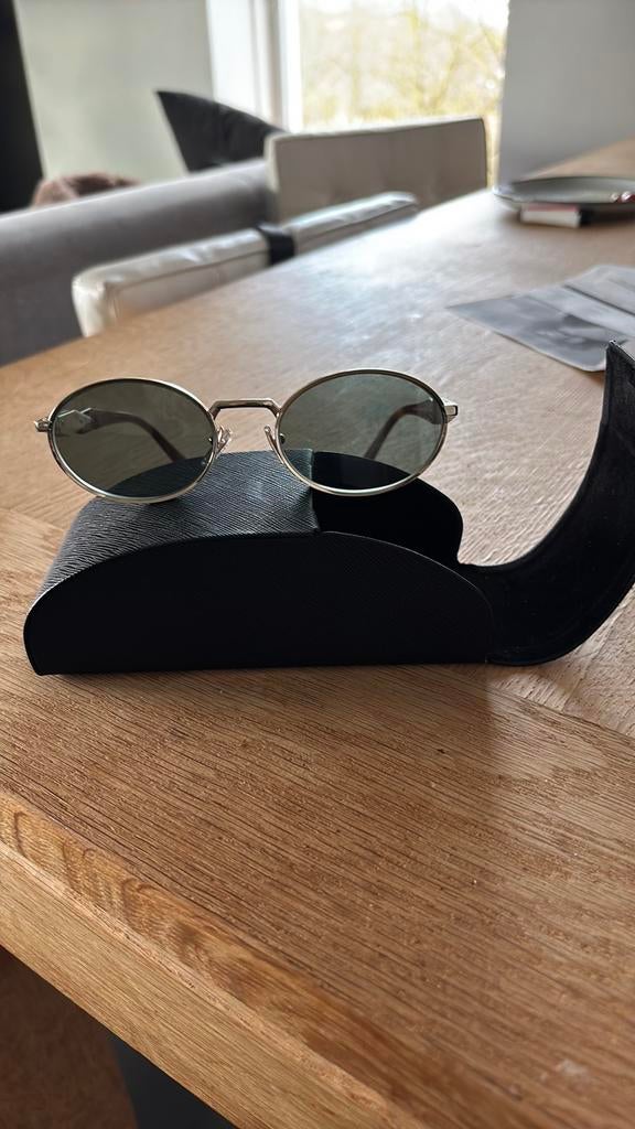Prada milano SPR65Z ZVN-70L met brillenkoker zonder bonnetje, Ophalen of Verzenden, Zo goed als nieuw, Zwart, Overige merken