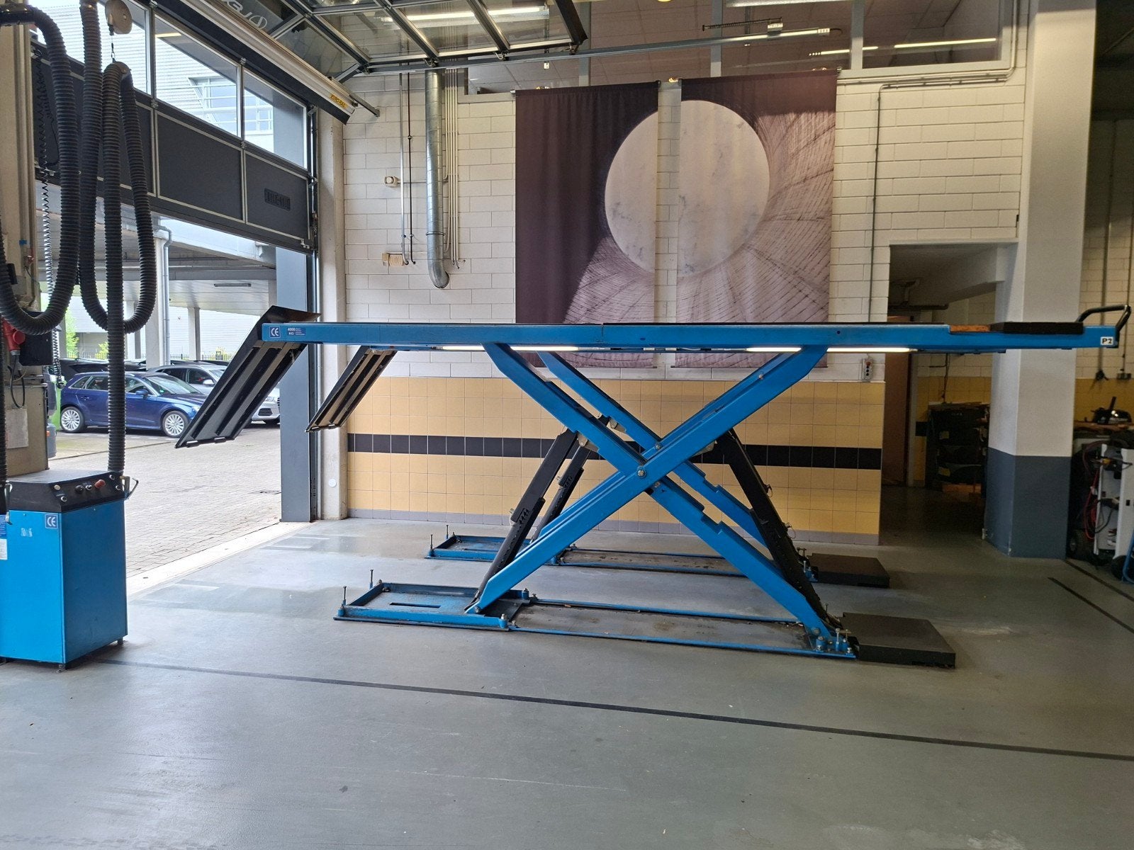 Hefbrug schaar Sun 4000 kg rai apk schaarhefbrug, Ophalen