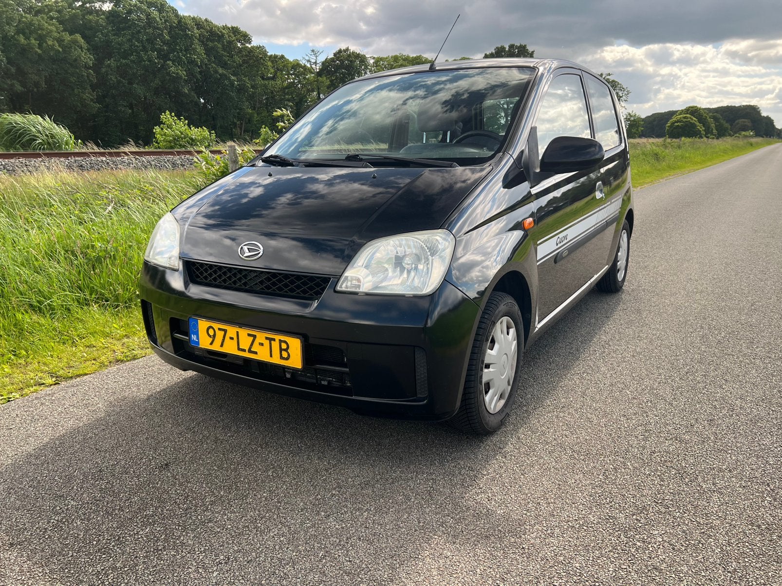 Daihatsu Cuore 1.0 airco 3D 2003 Zwart, Auto's, Daihatsu, Particulier, Cuore, Airbags, Airconditioning, Benzine, A, Hatchback
