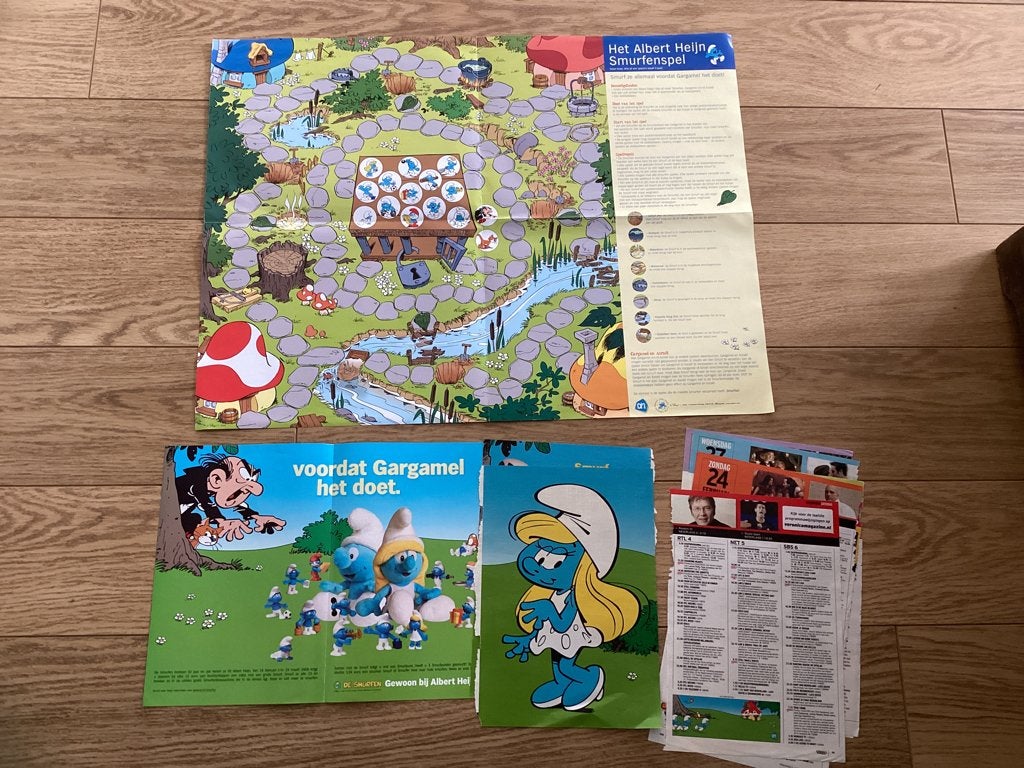 smurfen AH spel met extra wat knipsels uit tv gids., Verzamelen, Ophalen of Verzenden, Zo goed als nieuw, Verschillende Smurfen