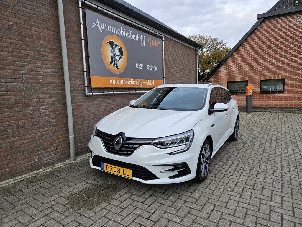 Renault Mégane Estate 1.3 TCe 140 Techno (bj 2023), Gebruikt, 4 cilinders, Leder en Stof, Wit