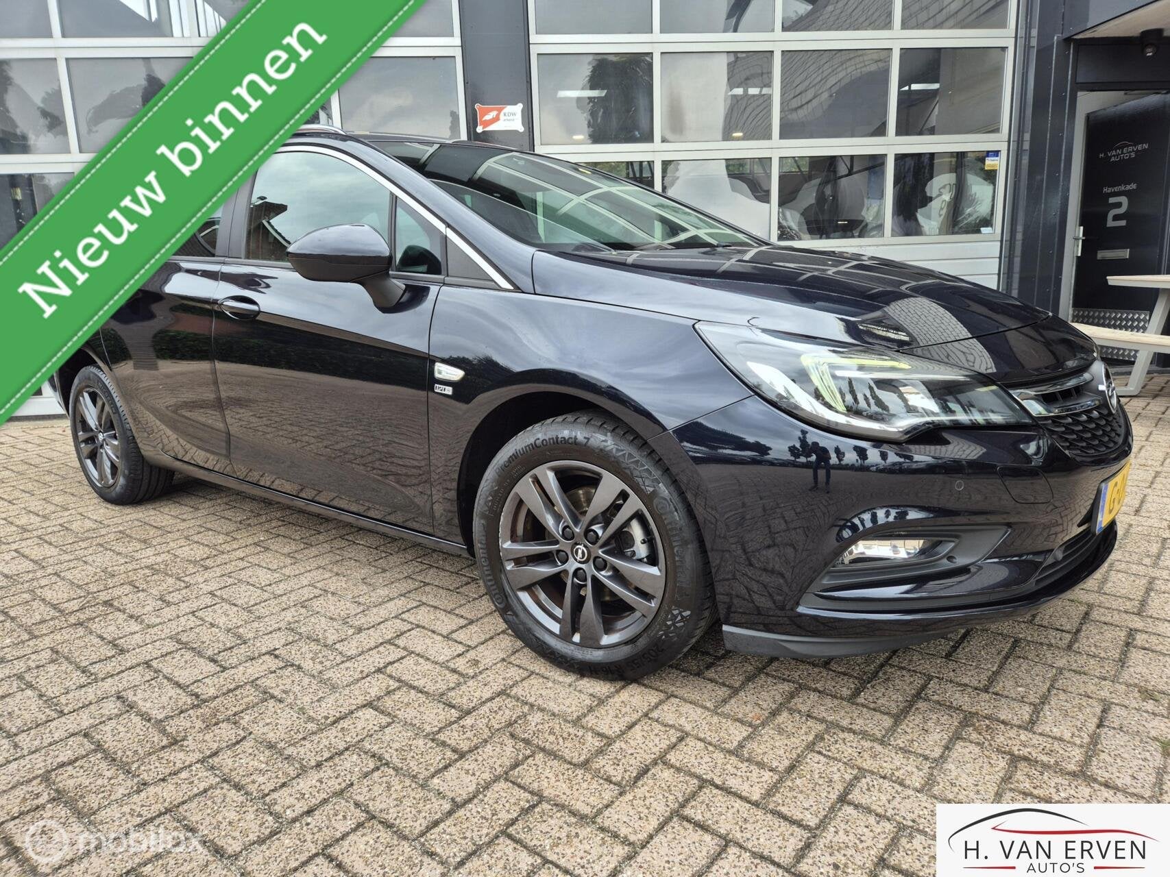 Opel Astra Sports Tourer 1.4 Turbo 120 Jaar Edition, Auto's, Voorwielaandrijving, 4 cilinders, 150 pk, Blauw