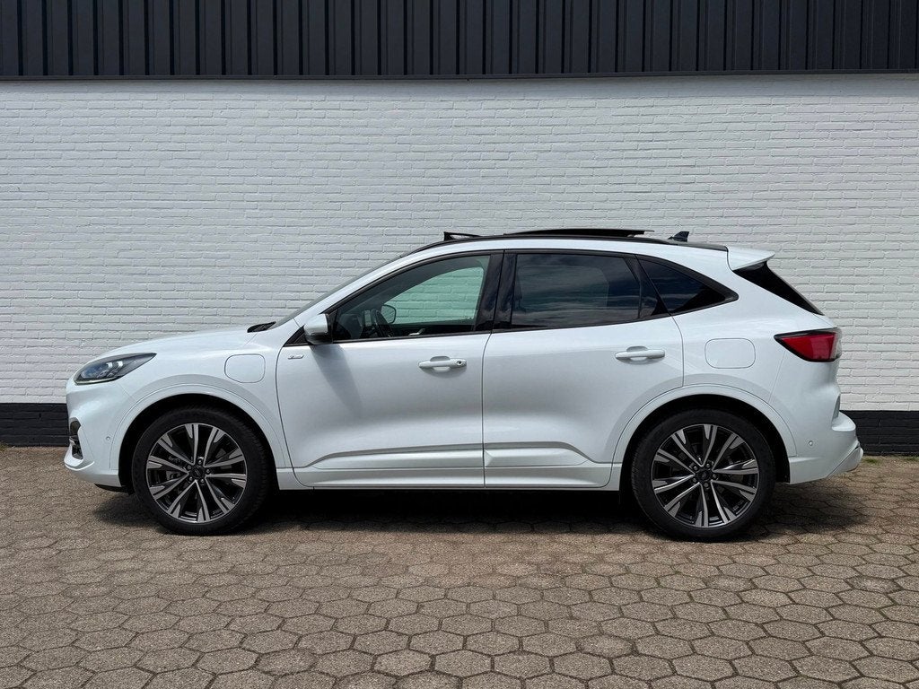 Ford Kuga PHEV ST-Line X l PANO l TREKHAAK l ACC l TOPSTAAT!, Auto's, Ford, Gebruikt, Zwart, 4 cilinders, Wit