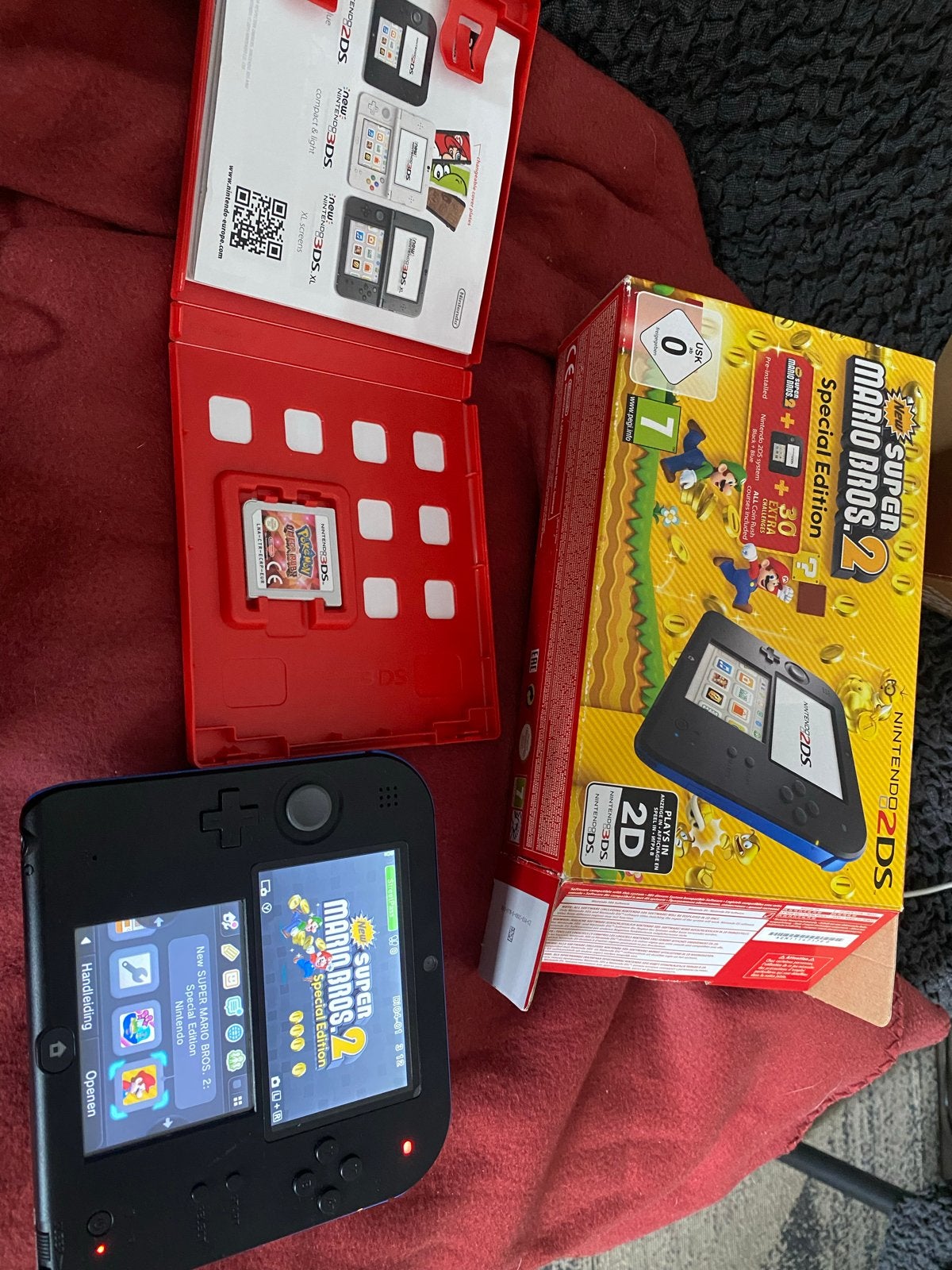Nintendo 2DS Zwart/Blauw met New Super Mario Bros. 2 en Poké, Spelcomputers en Games, Spelcomputers | Nintendo 2DS en 3DS, Met games