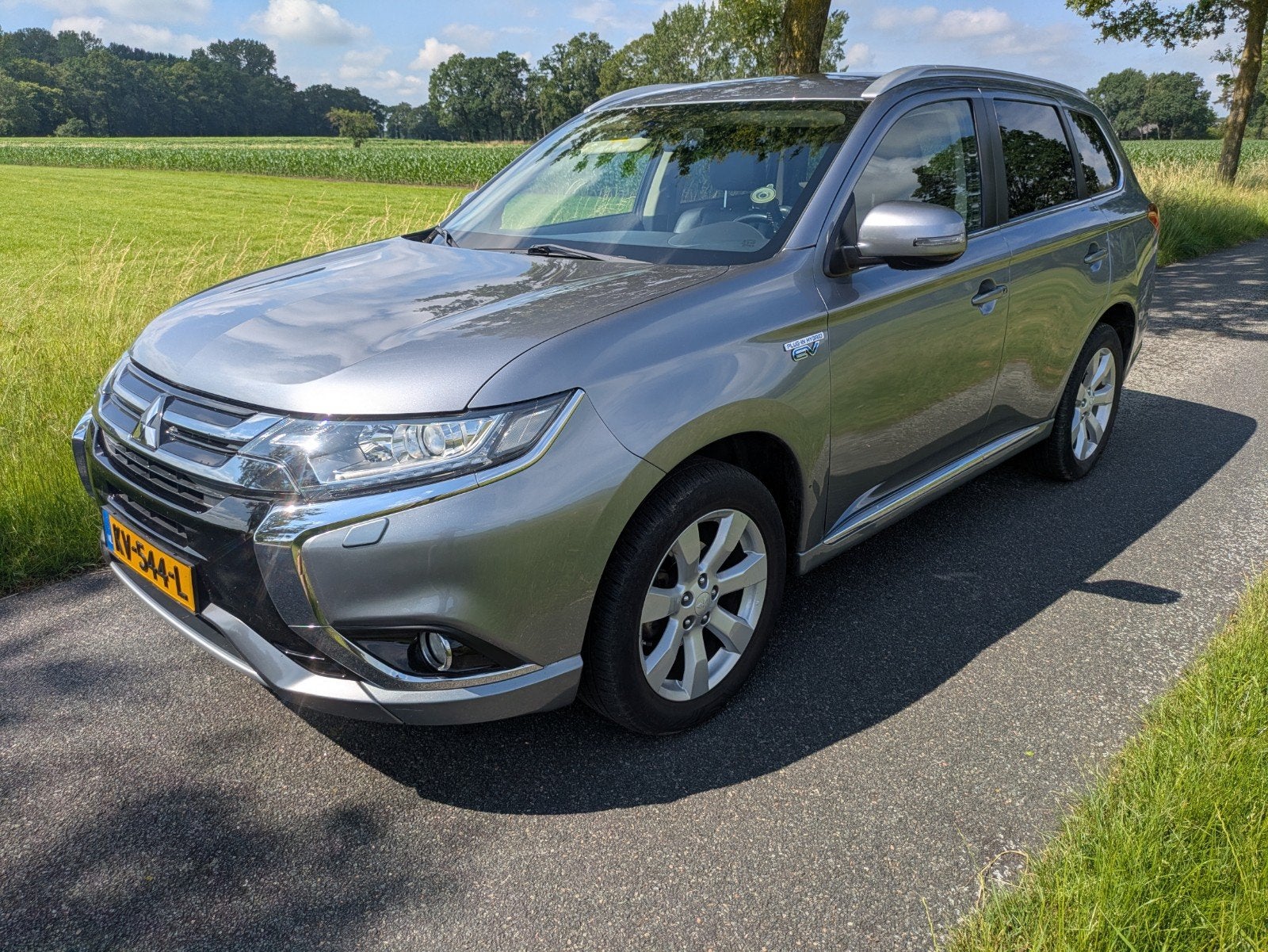 Mitsubishi Outlander 2.0 PHEV Business 2016 NAP trekhaak, Auto's, 1998 cc, Outlander, Zwart, 4 cilinders
