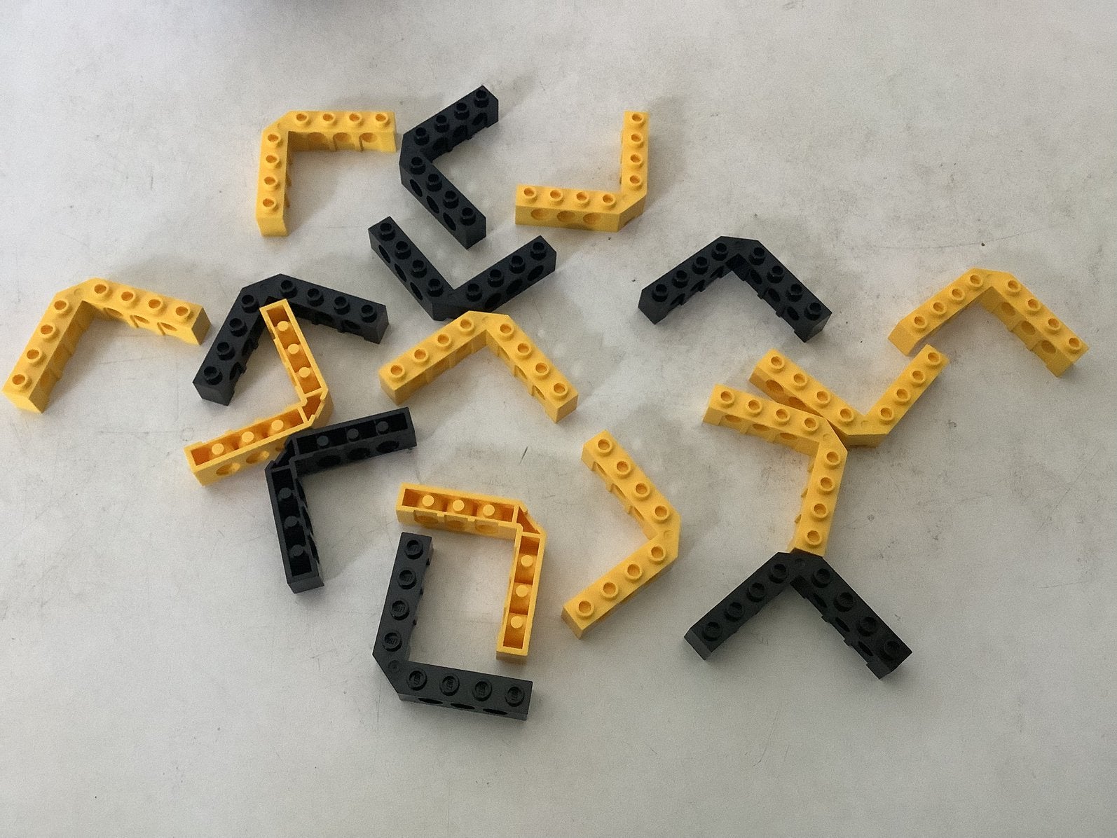 Lego technic steen 5x5 hoek 1x4-1x4 geel en zwart, Ophalen of Verzenden, Gebruikt, Losse stenen, Lego