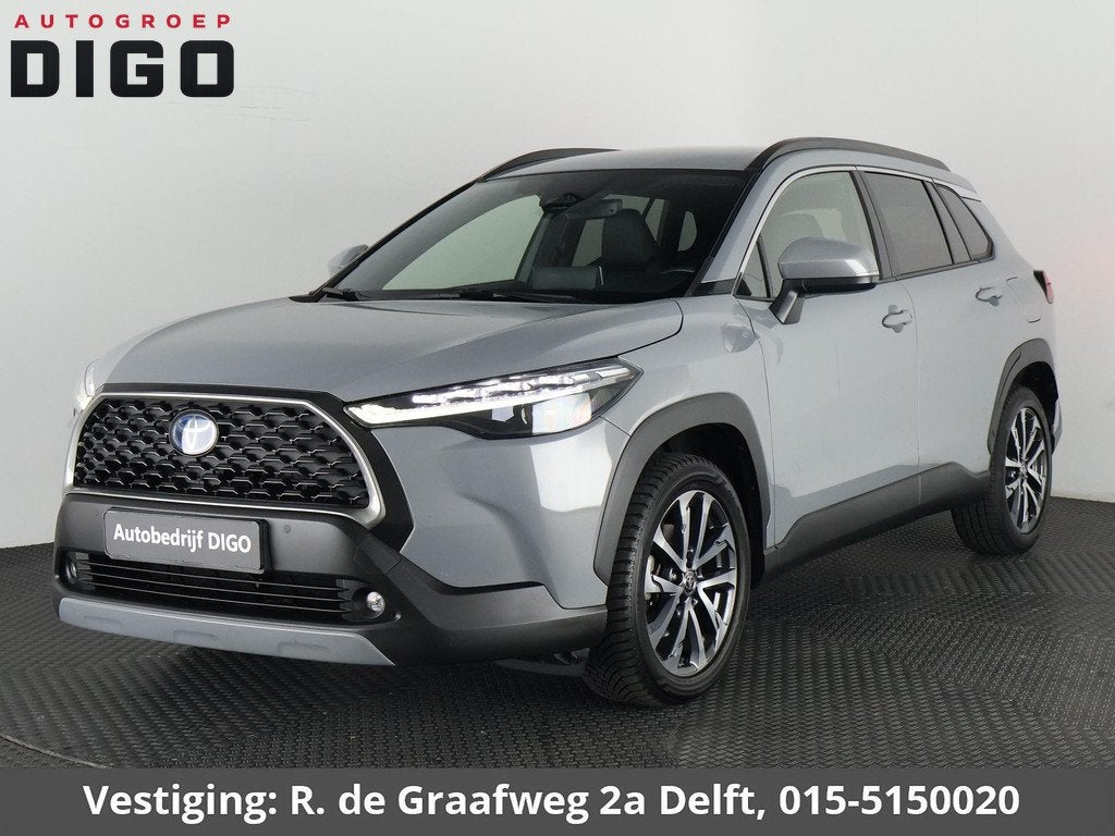 Toyota Corolla Cross 2.0 High Power Hybrid First Edition | A, Gebruikt, 4 cilinders, Leder en Stof, Origineel Nederlands