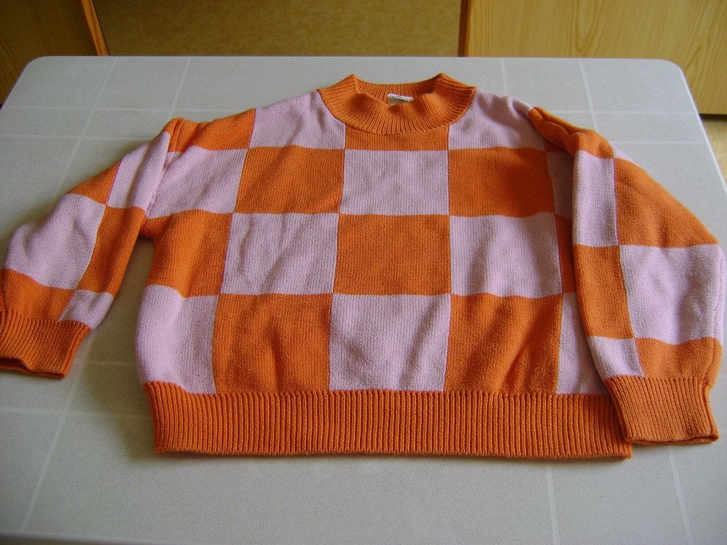 oranje geblokte trui maat 110 van de hema, Trui of Vest, Ophalen of Verzenden, Zo goed als nieuw, HEMA