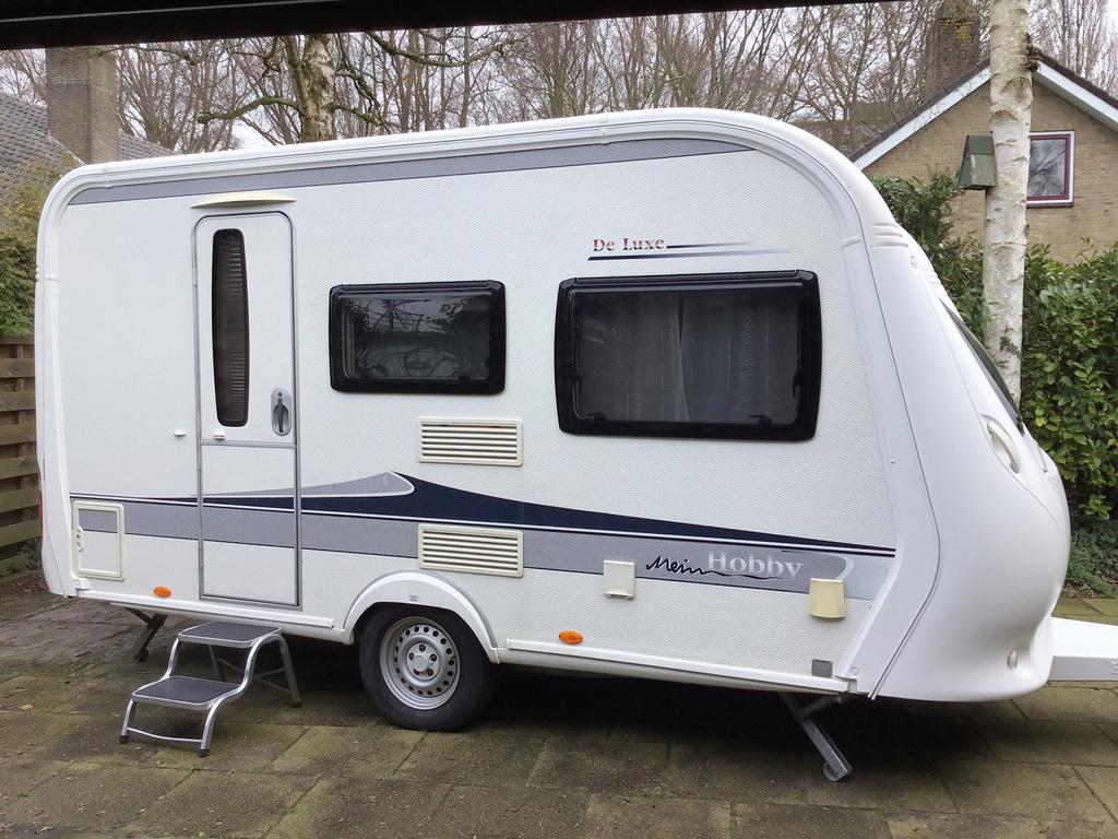 HOBBY DE LÚXE 400SF&UNICO!Lúxe Voortent.2013.Nieuwstaat., Caravans en Kamperen, Caravans, Vast bed, Hobby, Treinzit, Particulier