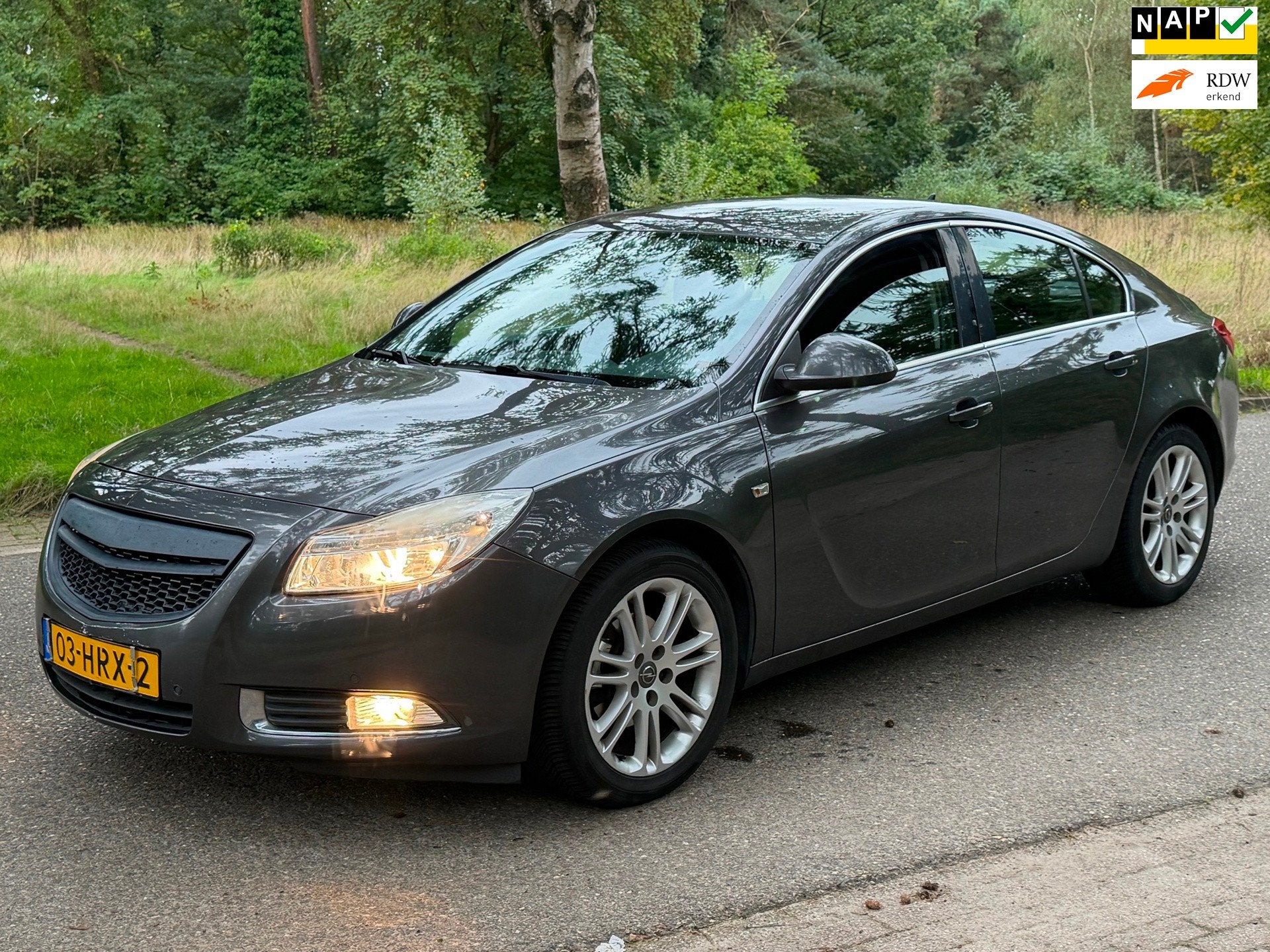 Opel Insignia 1.8 Edition Hatchback 2009 Navi 18 inch, Stof, Gebruikt, Zwart, 4 cilinders