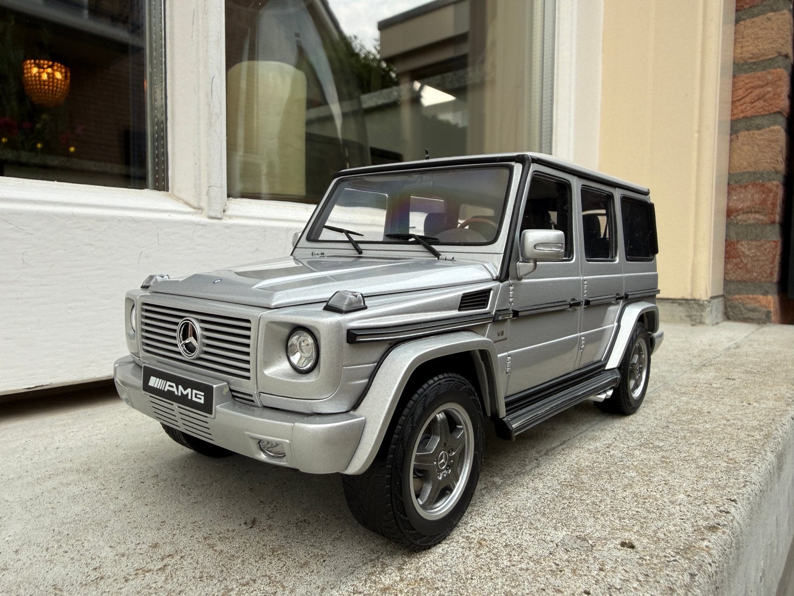 1:18 Mercedes G-Klasse G55 AMG zilver 2009 Autoart 76247, Hobby en Vrije tijd, Modelauto's | 1:18, Auto, Autoart, Ophalen of Verzenden