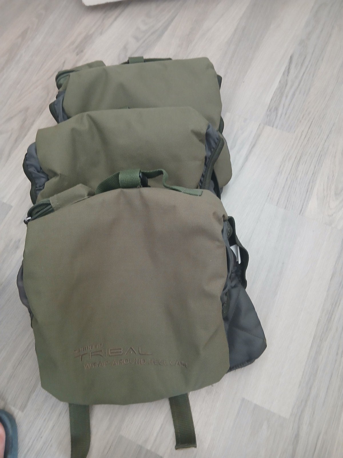 3x Shimano tribal reelcase met loodvakje, Ophalen, Zo goed als nieuw, Molen