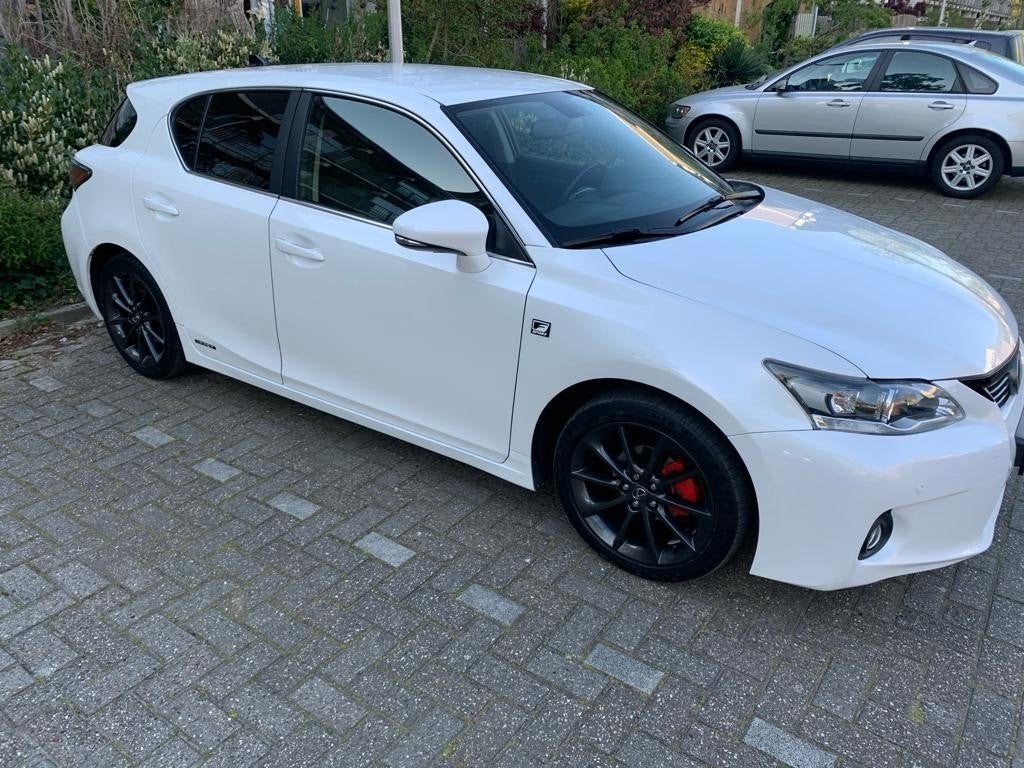 Lexus CT-H 200H 1.8 Hybrid 2011 Wit, Auto's, Achteruitrijcamera, 4 cilinders, Leder en Stof, Wit