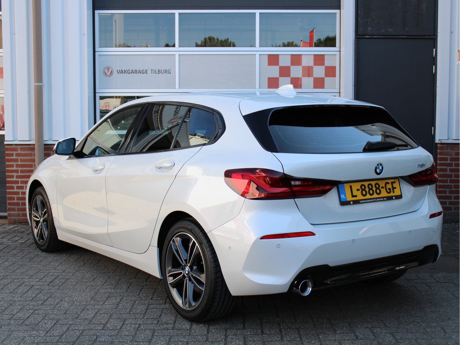 BMW 1-serie 118i Business Edition Sport Automaat Stoelverw/H, Auto's, 136 pk, Gebruikt, Verwarmde buitenspiegels, Leder en Stof