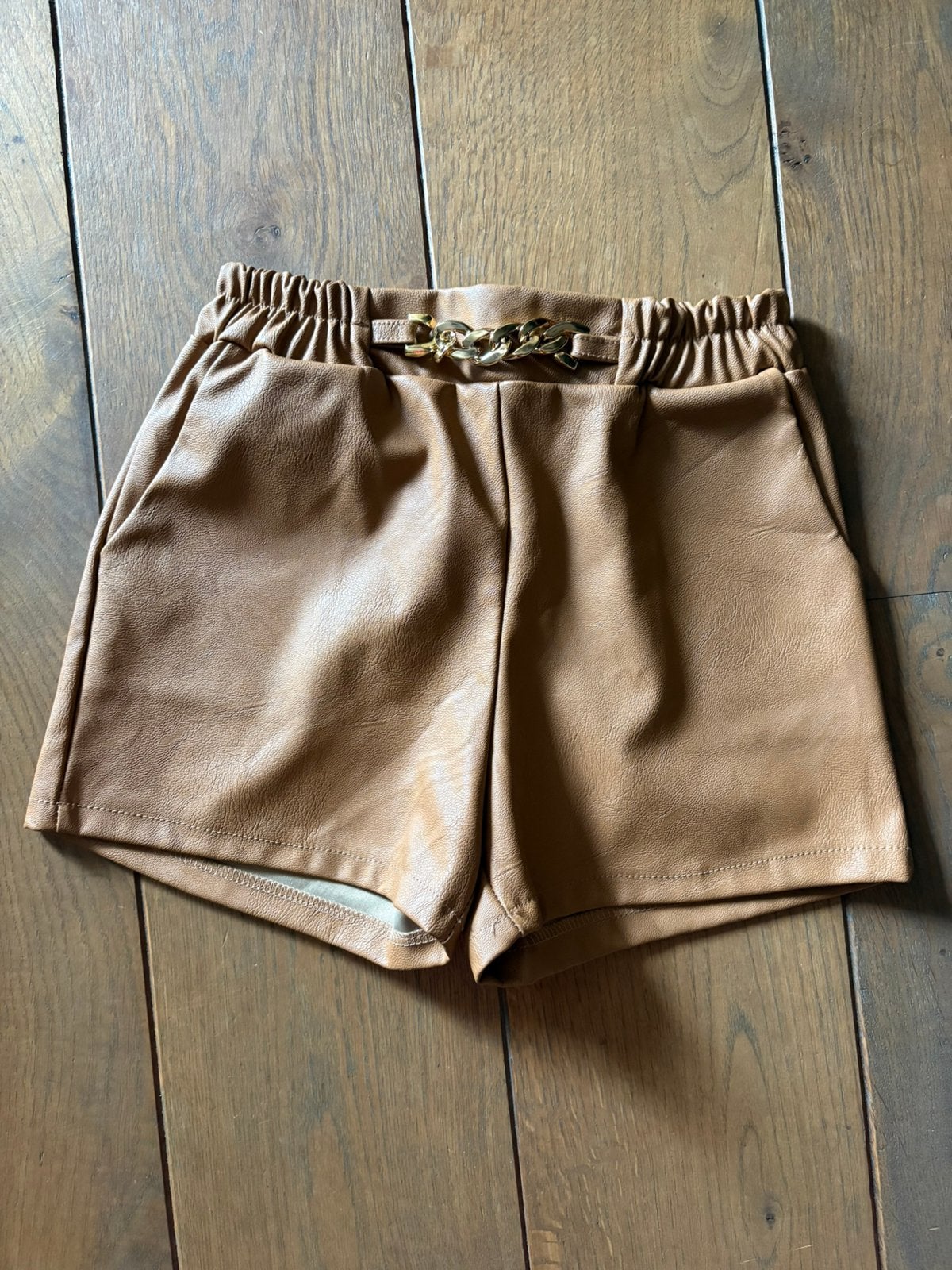 Kort leren broekje maat 12 (152), Ophalen of Verzenden, Zo goed als nieuw, Meisje, Broek