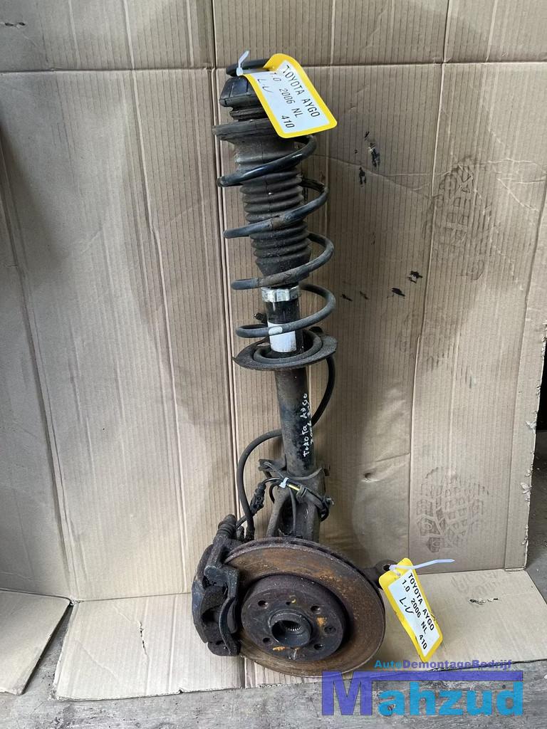 TOYOTA AYGO Links veerpoot compleet met remklauw 2005-2014, Info@toyota.co.jp, Gebruikt, Toyota Motor Corporation, Toyota