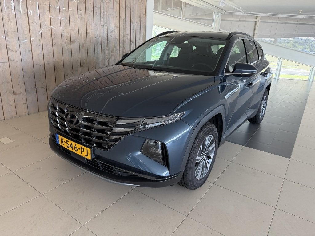 Hyundai Tucson 1.6 T-GDI HEV Comfort Smart (bj 2022), Gebruikt, Euro 6, 4 cilinders, Blauw