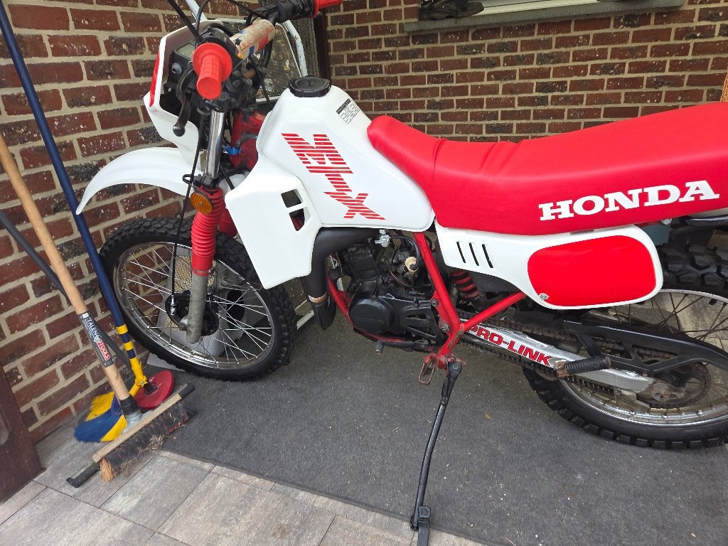 Honda mtx AD06 ( liquid cooled) originele uitlaat gezocht, Ophalen of Verzenden, Uitlaat