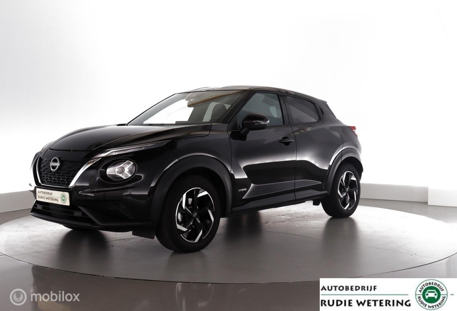 Nissan Juke 1.6 Hybrid 143 PK Automaat N-Connecta 1/2leer|le, Auto's, 1300 kg, Gebruikt, Met garantie (alle), Leder en Stof