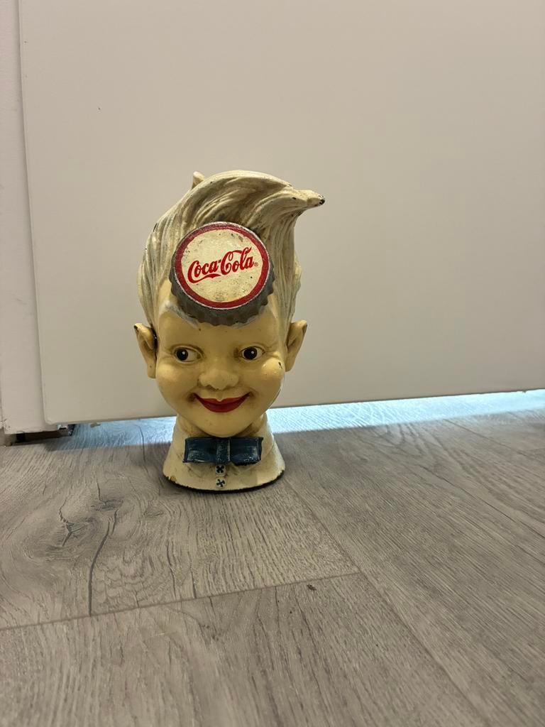 Coca cola  hoofd spaarpot gietijzer, Verzamelen, Spaarpotten, Ophalen, Gebruikt, Metaal of Blik, Overige thema's