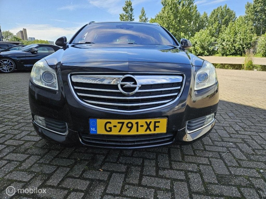 Opel Insignia Sports Tourer 2.0 T Cosmo 4x4, Auto's, Opel, 4 cilinders, Zwart, Handgeschakeld, Vierwielaandrijving