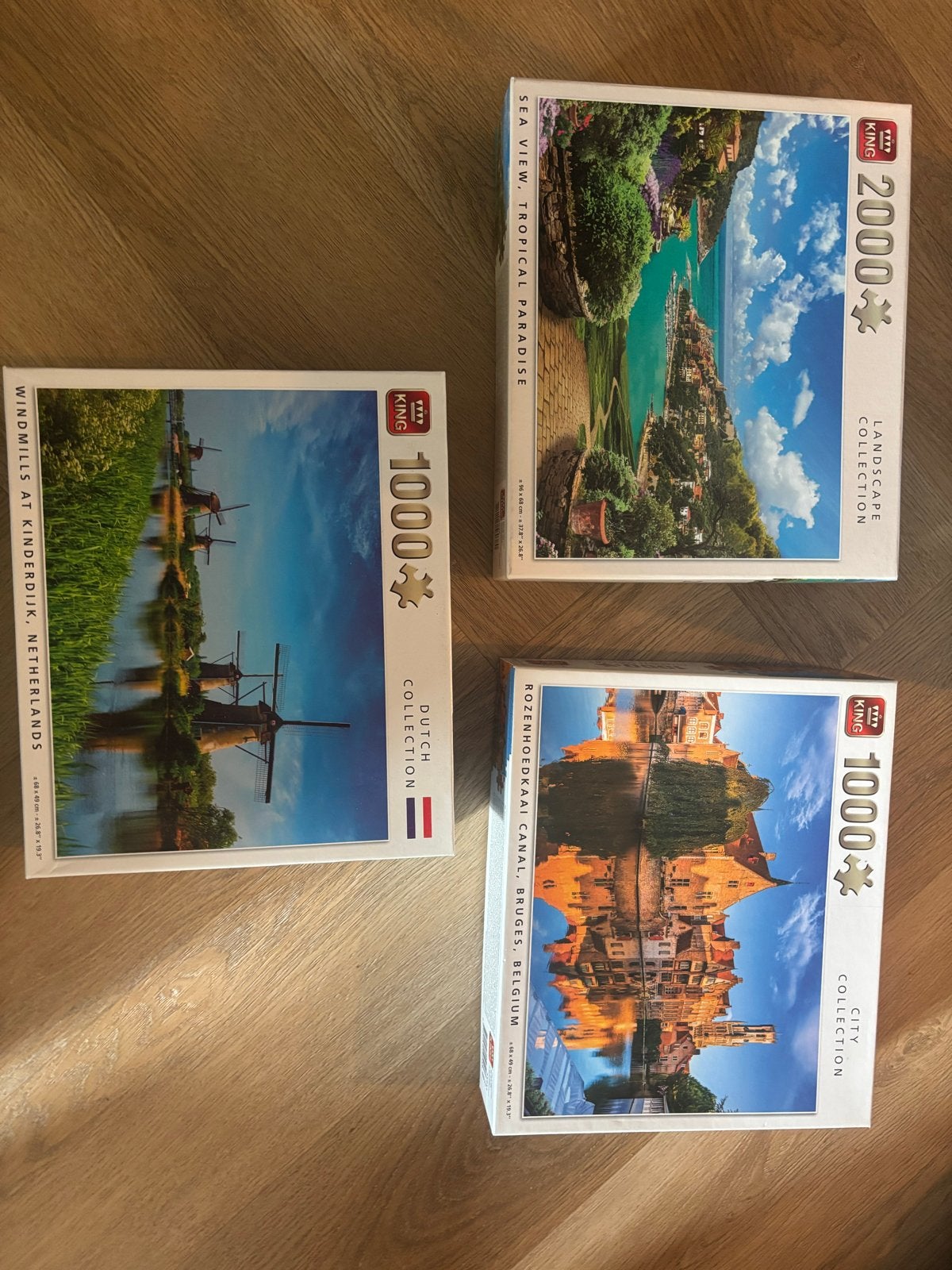 King Legpuzzels: Molens, Brugge & Tropisch Paradijs, Ophalen of Verzenden, Meer dan 1500 stukjes, Zo goed als nieuw, Legpuzzel