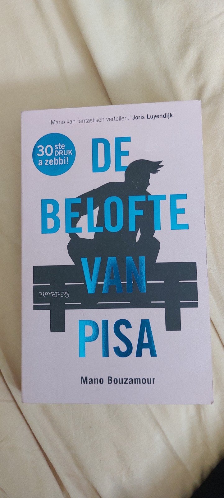 De belofte van Pisa - Mano Bouzamour (30e druk), Boeken, Ophalen of Verzenden, Zo goed als nieuw, Mano Bouzamour, Nederland