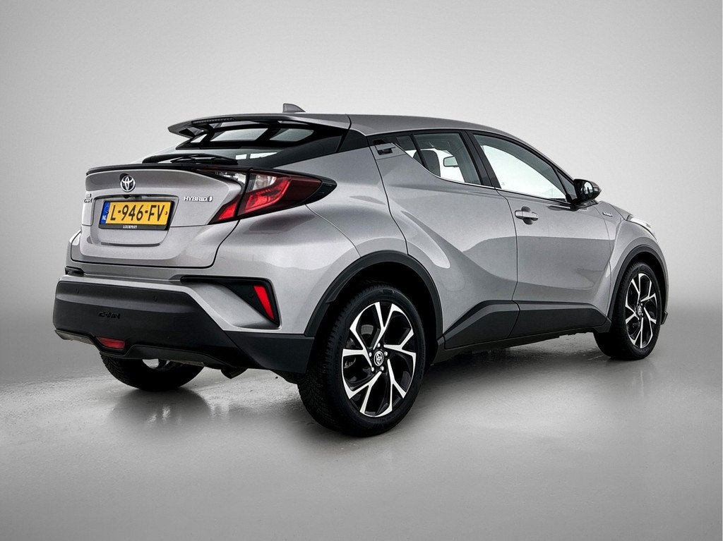 Toyota C-HR 1.8 Hybrid Dynamic | Parkeersensoren | Navigatie, Auto's, Toyota, 12 maanden, Stof, 4 cilinders, 122 pk